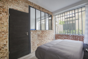 grande verrièe fenêtre chambre Paris