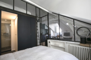 furnished studio with mezzanine and glazed partition in Paris