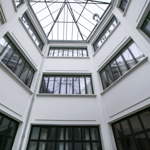 large bay windows atrium Paris building