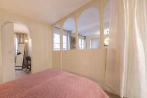 bedroom with glass partition funrished rental Paris