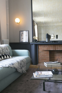 brick and marble chimney Paris style apartment