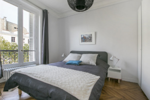 two-bedroom apartment Children’s bedroom and master bedroom Paris flat