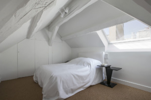 Bedroom with view over the roofs of Paris rental