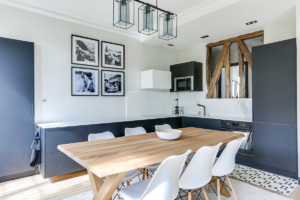 furnished two bedroom apartment exposed beams Paris Raspail