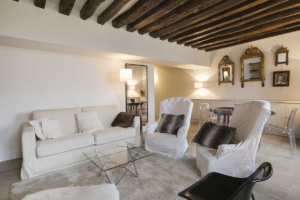 furnished flat Paris living room with exposed beams