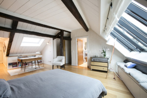 rent an apartment Paris under the eaves exposed beams