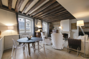 rent a furnished two-bedroom apartment with exposed beams Paris
