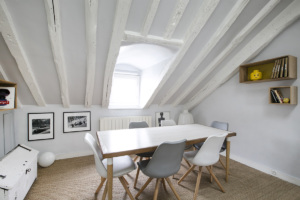 Rue de Grenelle furnished rental apartment with beams dining area