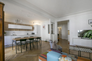 Live in Paris furnished rental kitchen opens on liviing