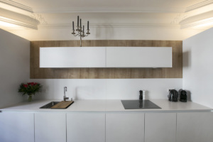 White wooden kitchen furnished rental in Paris