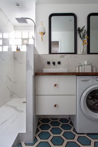 In the bathroom, cement tand marble effect tiles