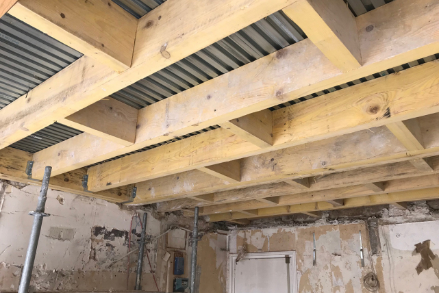 Before/after: timber load-bearing beams