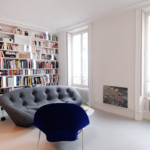 Furnished apartment with a beautiful bookshelf and designer furniture