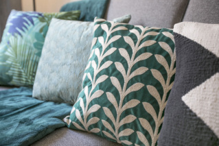 Mix and match colours and textures - A sofa in a living room